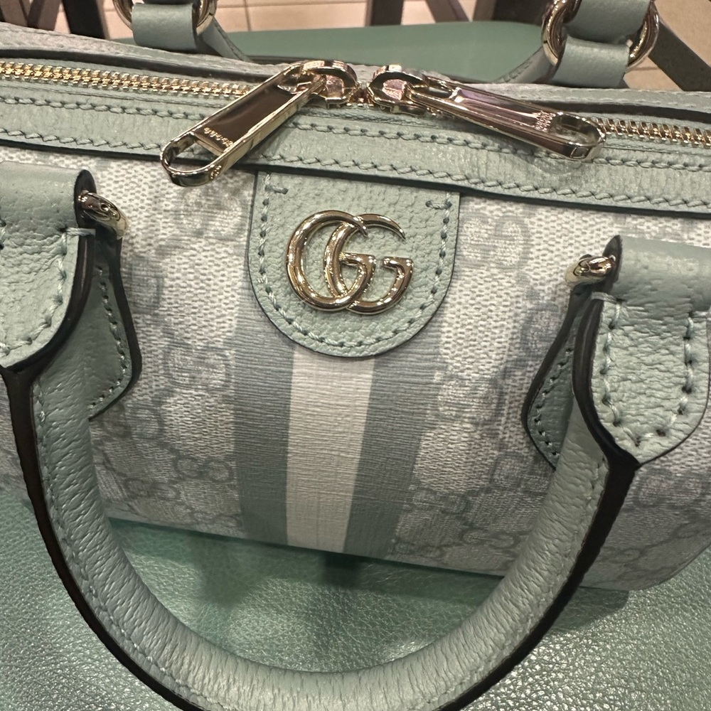 Authentic Gucci Blue Satchel with Signature Design